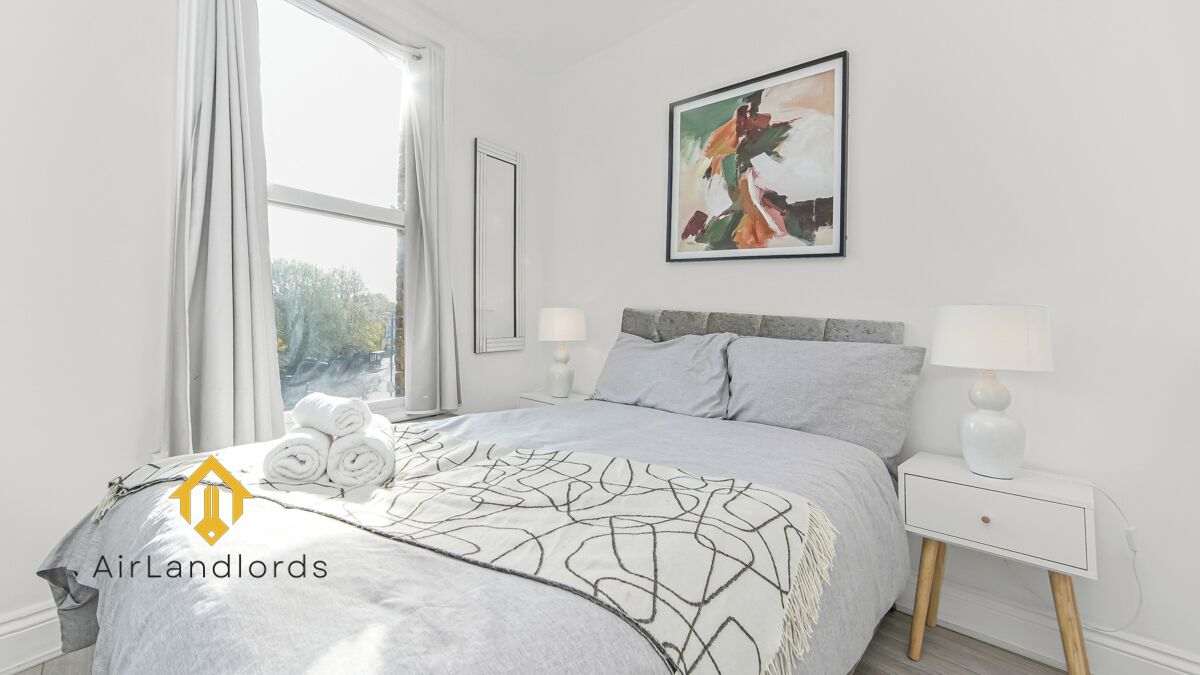 2 dormitorios, tabla de planchar con plancha, wifi gratis y ropa de cama