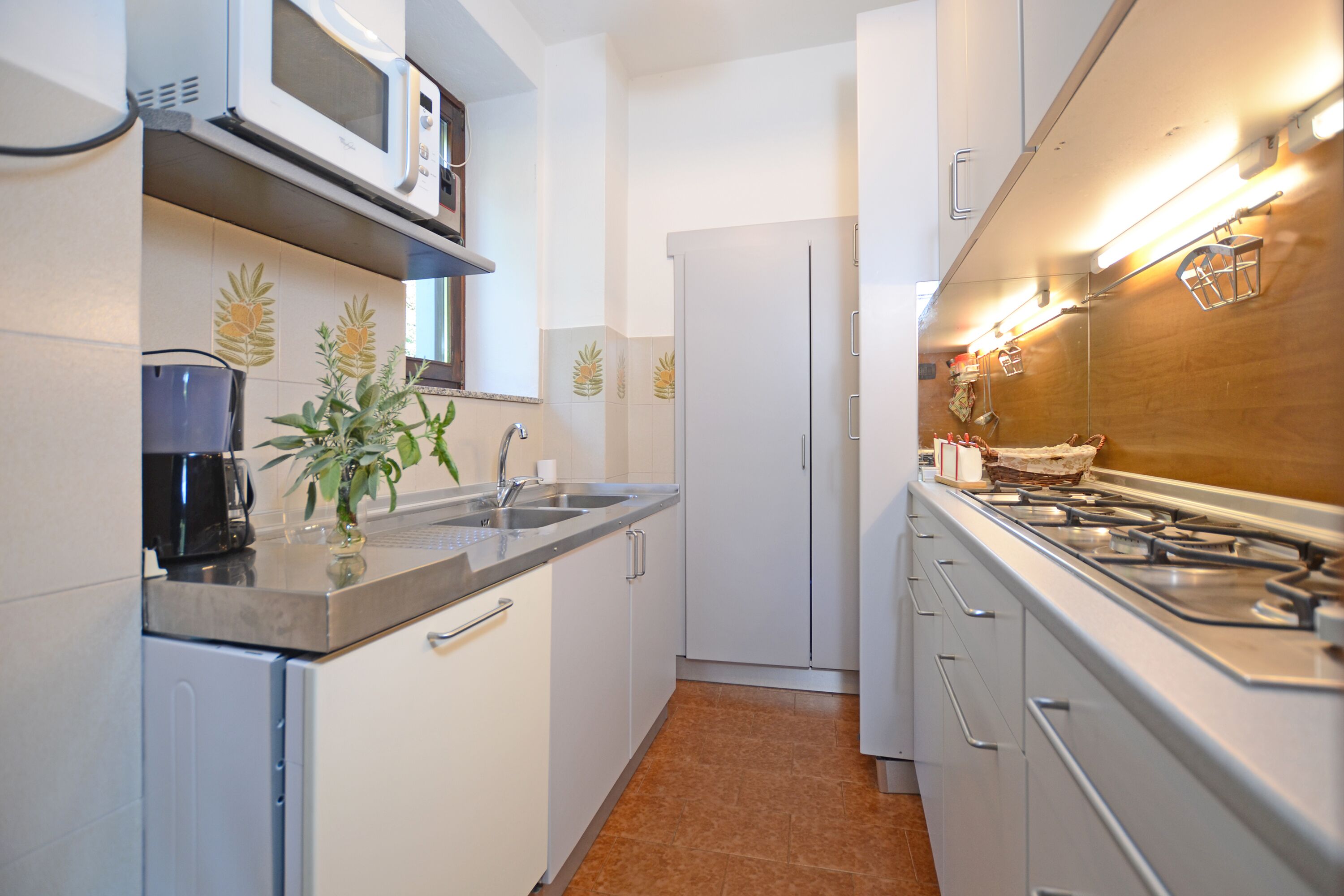 Rumah Standar, beberapa kamar, 2 kamar mandi (Casa Letizia) | Dapur kecil pribadi | Lemari es, microwave, kompor, dan mesin pencuci piring