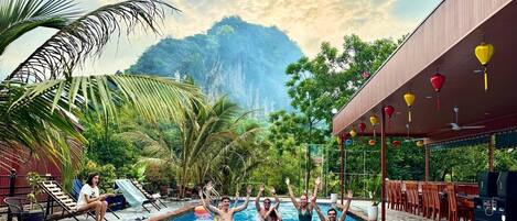 Outdoor pool, pool umbrellas, sun loungers