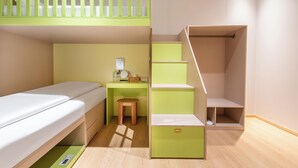 A compact room with a bunk bed, a desk, a chair, and a small stool. - Lemon Hotel- New World Shopping Mall (Wuhan)