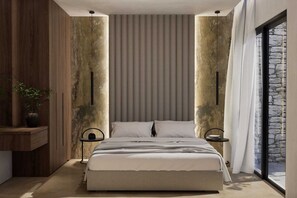 A modern bedroom with a large bed, a nightstand, a potted plant, and a stone wall.