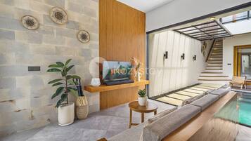 Villa, 2 Bedrooms, Balcony, Pool View | Living area | 43-inch Smart TV with cable channels, Netflix, streaming services