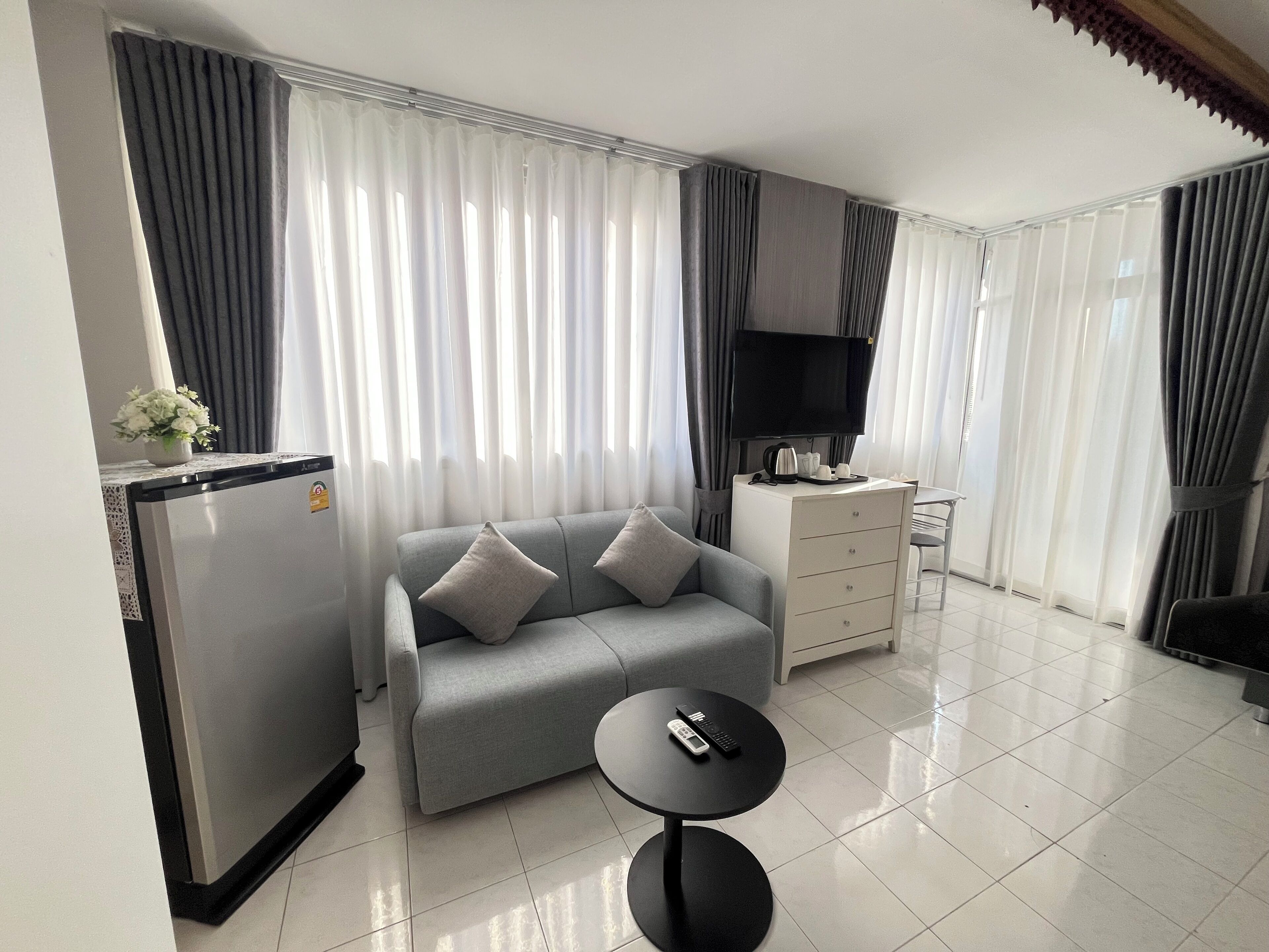 Premium Double Room, Balcony | Minibar, in-room safe, laptop workspace, iron/ironing board