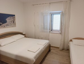 2 quartos, Wi-Fi de cortesia, roupa de cama