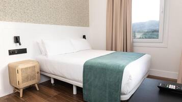 Standaard eenpersoonskamer | Een bureau, een laptopwerkplek, gratis wifi