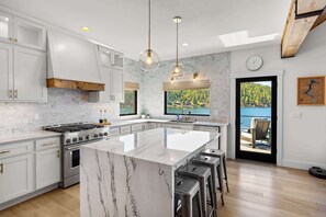 Fridge, microwave, oven, stovetop - Luxury Waterfront Retreat | Dock, Views & Lake Days (Harrison)