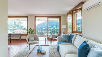 Family Apartment, Multiple Bedrooms, 2 Bathrooms, Mountainside (Villa Siwaton Bellavista 2) | Living area | 21-inch flat-screen TV with digital channels