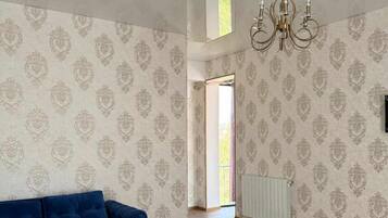 Deluxe Quadruple Room, Balcony | Free WiFi