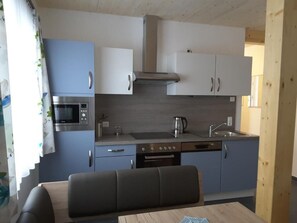 Appart'hôtel Confort, 2 chambres, animaux de compagnie acceptés, vue jardin | Cuisine privée