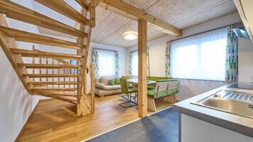 Comfort Condo, 2 Bedrooms, Pets allowed, Garden View | Living area | 50-inch flat-screen TV with cable channels