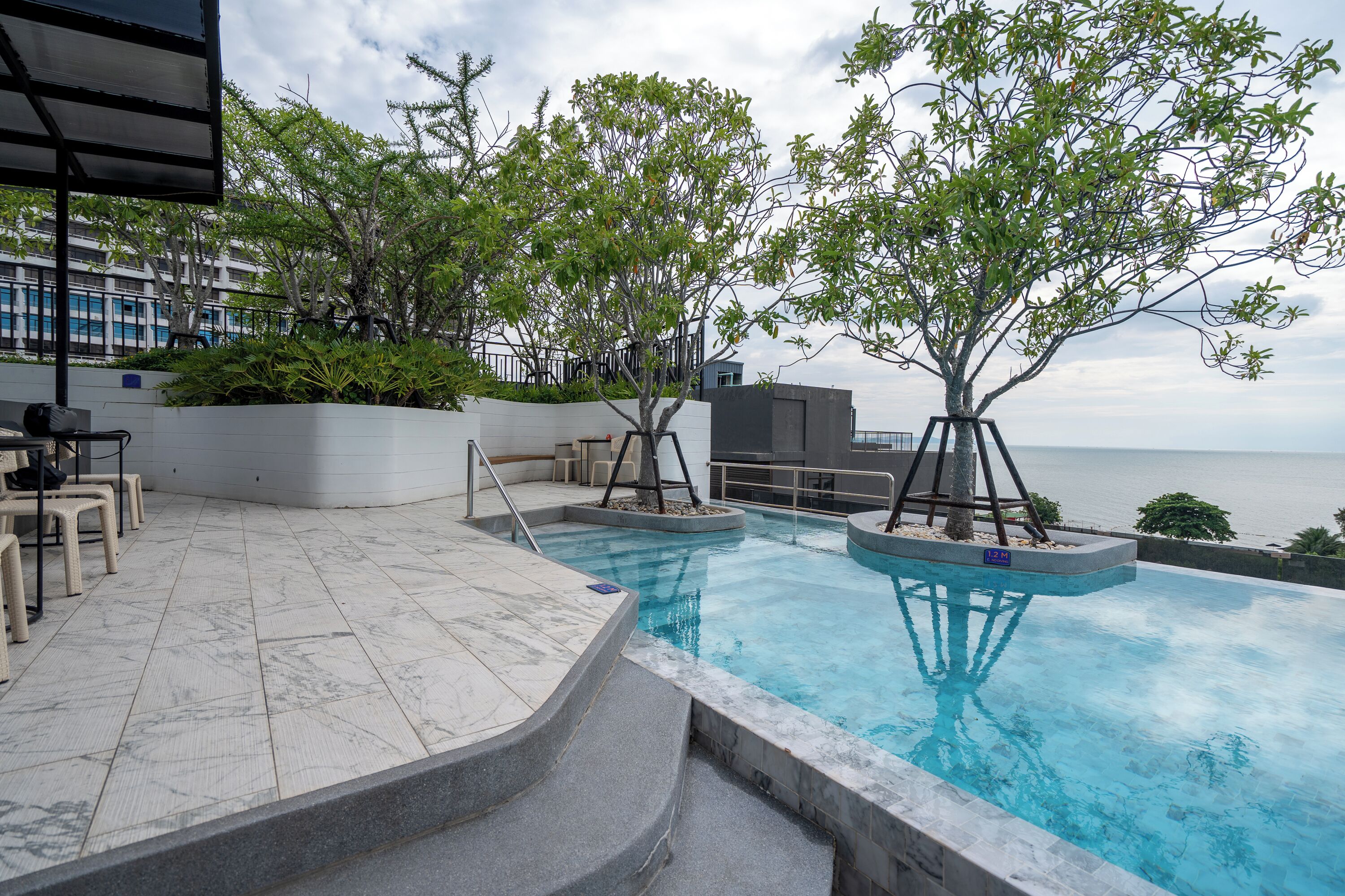 Outdoor pool, pool umbrellas, pool loungers