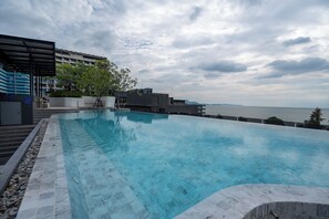 Outdoor pool, pool umbrellas, pool loungers