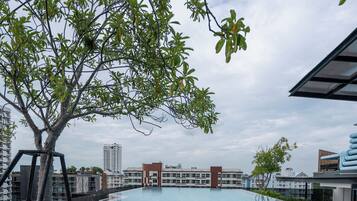 Outdoor pool, pool umbrellas, pool loungers