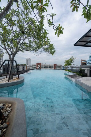 Outdoor pool, pool umbrellas, pool loungers