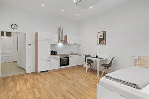 1 slaapkamer, een strijkplank/strijkijzer, wifi, beddengoed