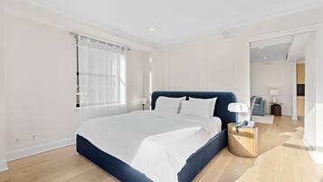 Kondominium, 1 kamar tidur, dapur, pemandangan taman | Brankas, meja kerja, ruang kerja ramah laptop, dan tirai kedap cahaya