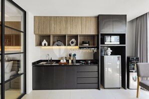 Apartment, 1 Bedroom, Resort View | Private kitchen | Full-size fridge, microwave, stovetop, rice cooker - Caraya by Kozystay - Nusa Dua (Nusa Dua)