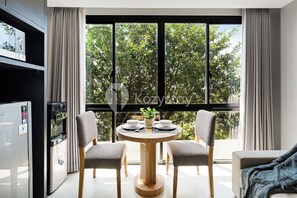 Apartment, 1 Bedroom, Resort View | Dining room - Caraya by Kozystay - Nusa Dua (Nusa Dua)