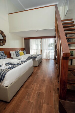 Family Loft, Balcony, Pool View | Premium bedding, memory foam beds, in-room safe, desk - Alima ARQ Beach Resort (San Agustin)