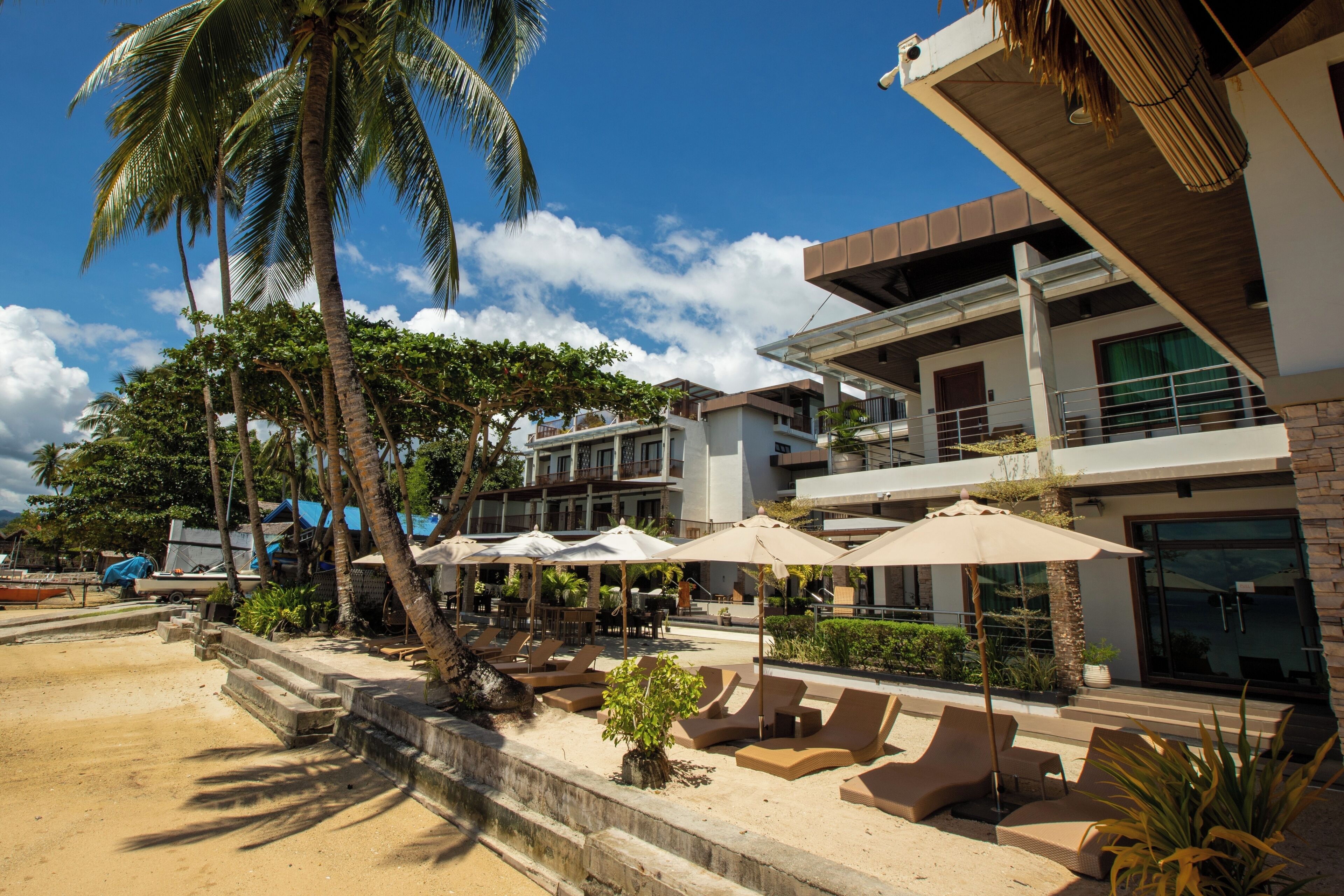 Private beach, white sand, sun loungers, beach umbrellas