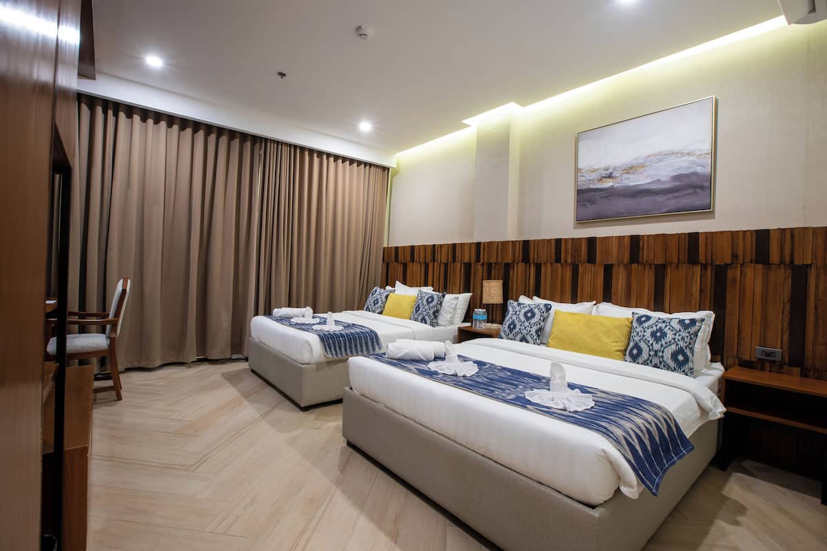Premium Quadruple Room, Balcony, Beach View | Premium bedding, memory foam beds, in-room safe, desk