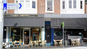 A storefront with outdoor seating and a sign for a Vietnamese restaurant. - Your Stylish Summer Escape in Paddington (Paddington)