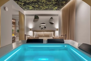 Luxury Suite, Private Pool | In-room safe, laptop workspace, blackout drapes, soundproofing
