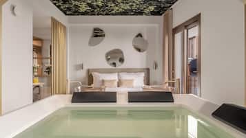 Suíte superluxo, piscina particular | Cofres nos quartos, espaço de trabalho para notebook, cortinas blackout