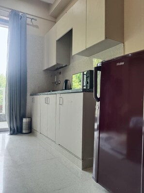 Estudio, vista a la ciudad | Cocina privada