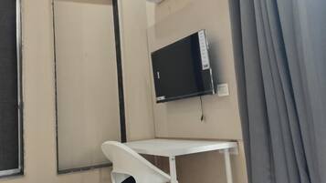 Estudio, vistas a la ciudad | Zona de estar