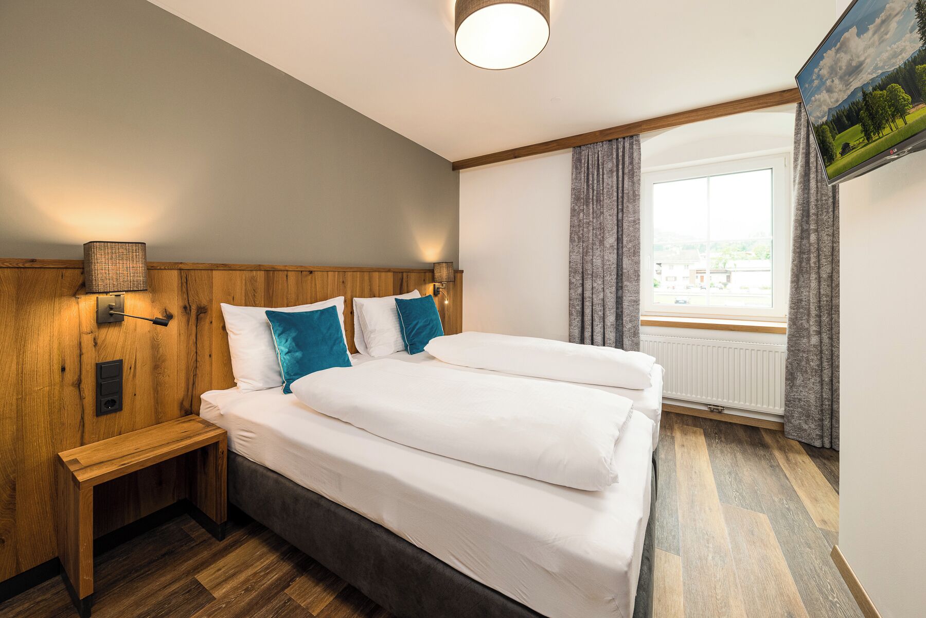 Suite Deluxe, vistas a la montaña | Minibar, caja fuerte, wifi gratis y ropa de cama