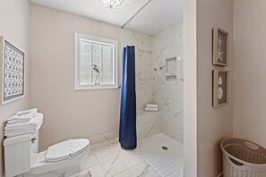 Shower, hair dryer, towels