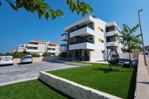 Front of property - evening/night - Relax apartments with private pool (Novalja)