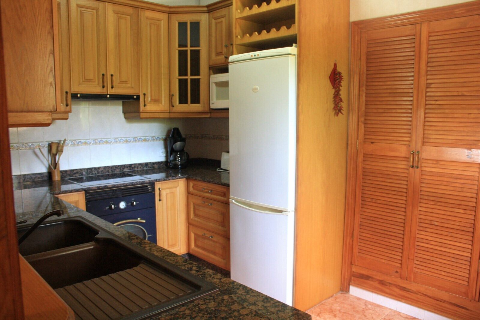 Microwave, coffee/tea maker, high chair, cookware/dishes/utensils