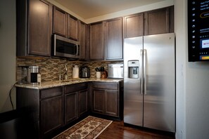 Fridge, microwave, coffee/tea maker, toaster