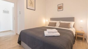 2 dormitorios, tabla de planchar con plancha, wifi gratis y ropa de cama