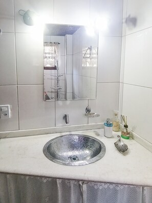 Hair dryer, towels, soap, toilet paper
