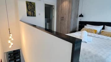 Coffres-forts dans les chambres, fer et planche Ă repasser
