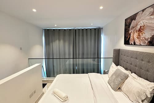 Premium bedding, memory-foam beds, in-room safe, laptop workspace