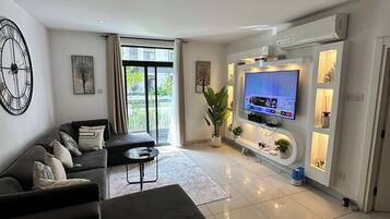 50-inch Smart TV with satellite channels, Netflix, Hulu