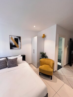 Premium bedding, memory foam beds, in-room safe, desk