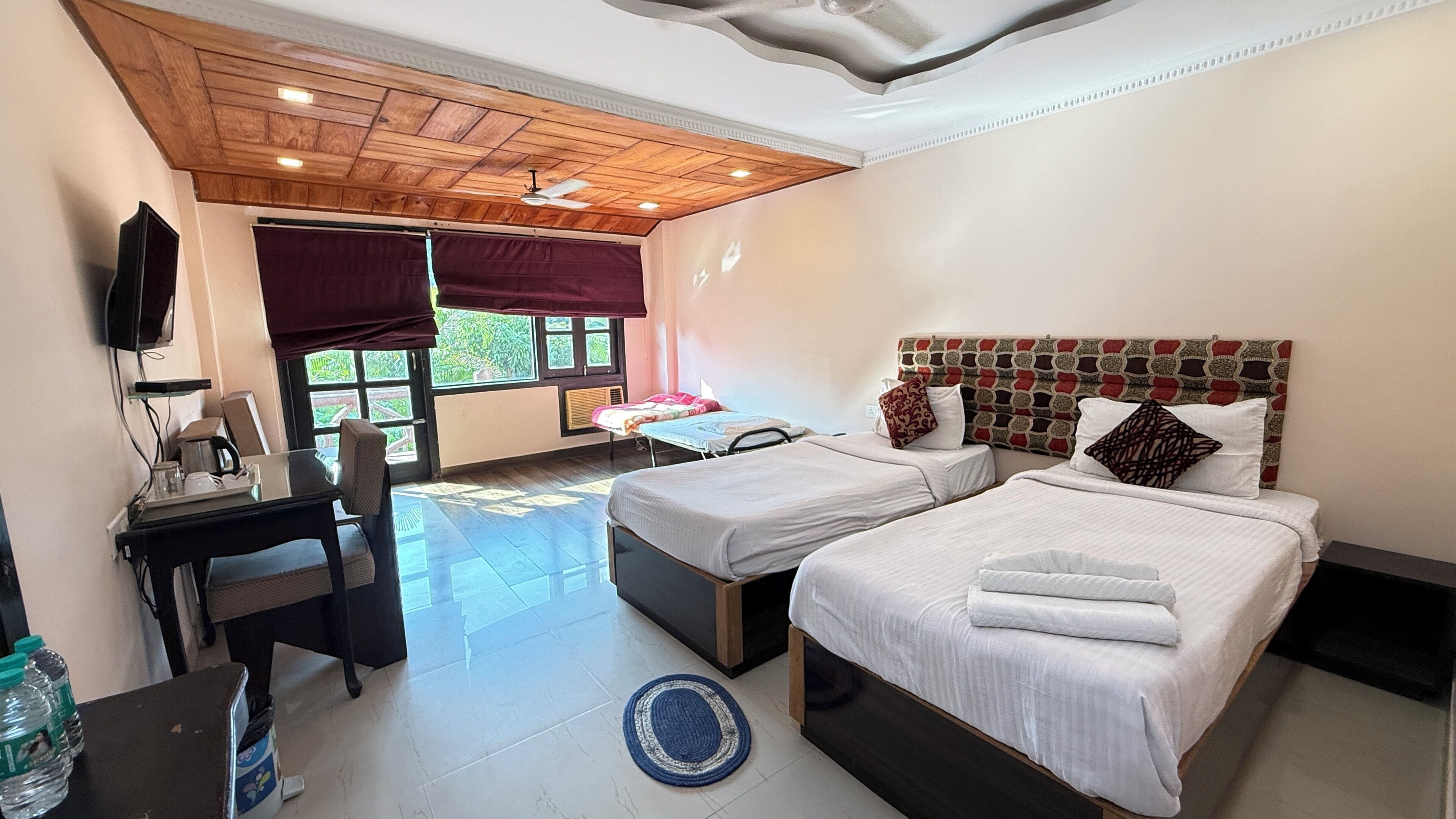 Desk, laptop workspace, blackout curtains, free WiFi