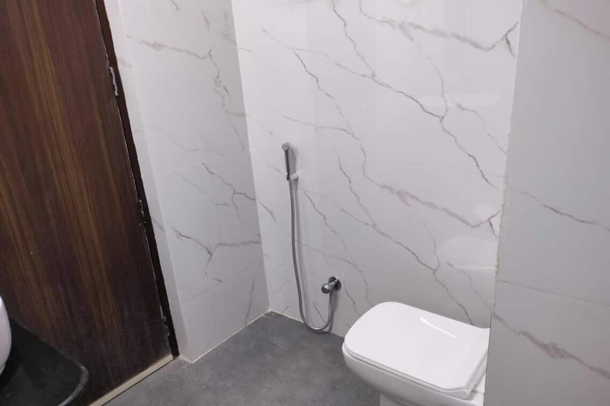 Shower, slippers, towels, soap