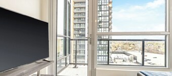 Modern High Rise Condo w Private Patio—Downtown