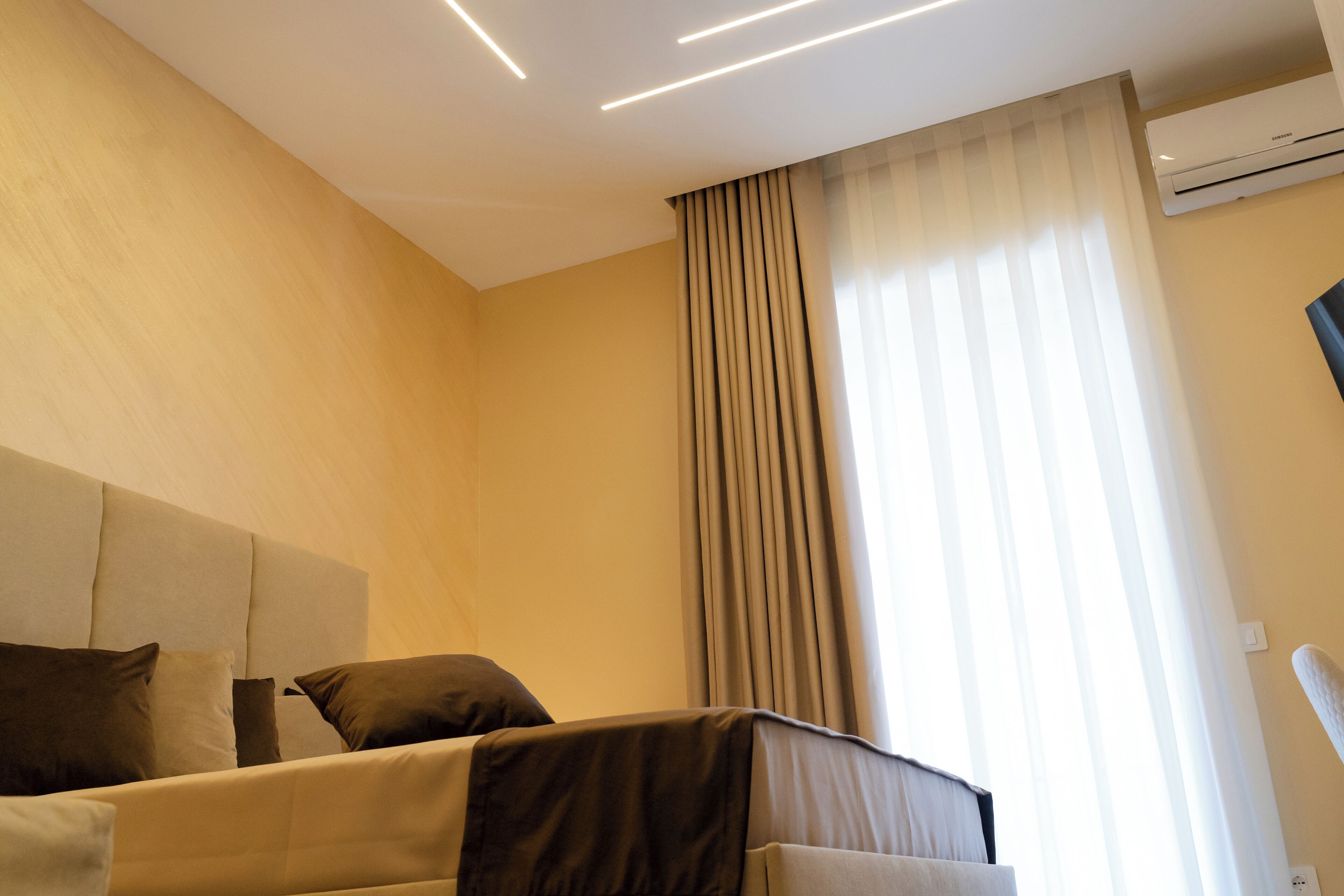 Doppia Deluxe, balcone, vista mare | Una cassaforte in camera, Wi-Fi gratuito