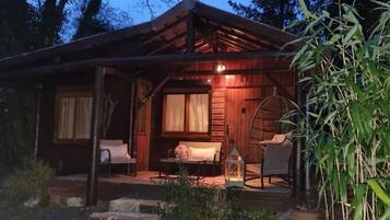 Deluxe kamer, terras, uitzicht op tuin | Terras