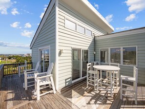 Outdoor dining - The Jackson: Cozy Beach Cottage with Pool! (Emerald Isle)