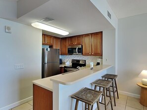 Fridge, microwave, oven, stovetop - Seychelles #402 | Gulf Front + Resort Amenities (Panama City Beach)