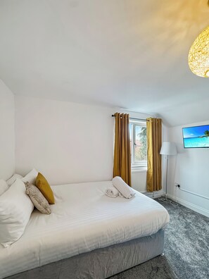 2 habitaciones, tabla de planchar con plancha y wifi gratis 