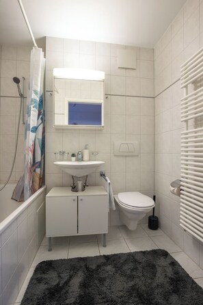 Hair dryer, towels, soap, shampoo